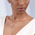 Silver necklace with raw diamond pendant in gold-plated setting by ORSKA