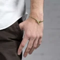 Złota bransoletka unisex na cienkim łańcuszku z kolekcji Fossil od ORSKA biżuteria