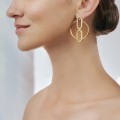 Gold circle stud earrings from the Holos HOK38-1 ORSKA collection