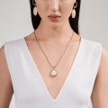 Short gold-plated necklace with white scarab by ORSKA