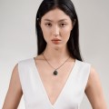 Silver necklace with a wooden scarab from the KEK78-2 ORSKA-b collection