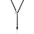 Carved snake necklace from the Kembali collection