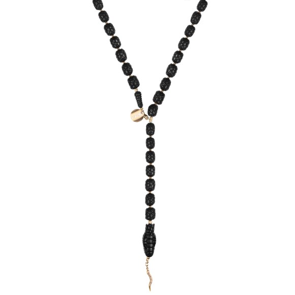 Carved snake necklace from the Kembali collection