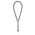 Snake necklace in the form of a tie made of wood