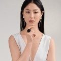 Large ring with wood carved rose from the Kembali collection KEP64-1 ORSKA-b