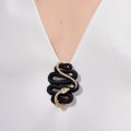 Wood carved brooch from the Kembali collection KEB78-1 ORSKA-d