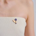 Asymmetric gold-plated lapis lazuli pin from the Orini ORSKA collection