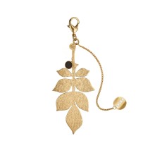 Keychain with ceramic in the shape of a rose leaf from the Monumental collection