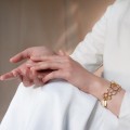Delicate golden bracelet inspired by honeycombs APA36 from the APIS collection by ORSKA jewelry