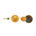 Artistic three-finger ring with amber and colored stones made of recycled plastic by ORSKA jewelry brand