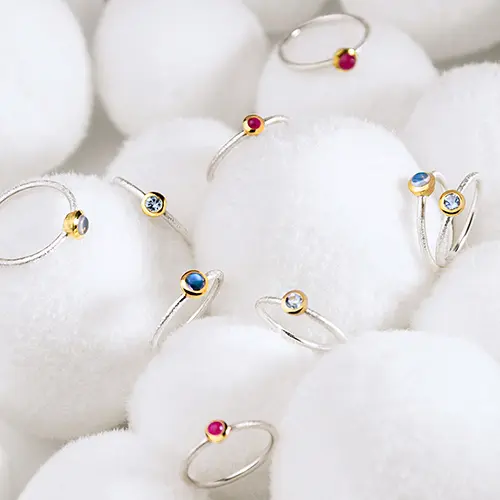 Silver rings with colorful gems