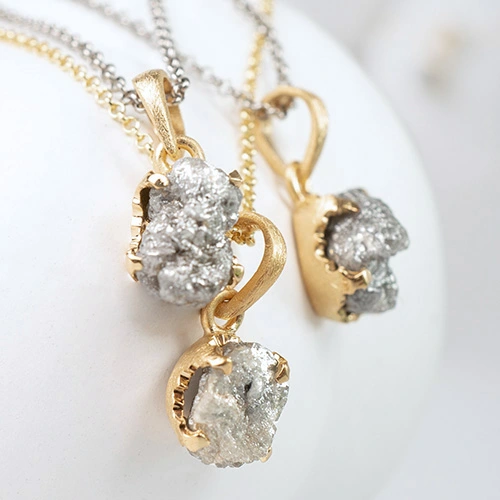 Silver necklaces with dimond pendants